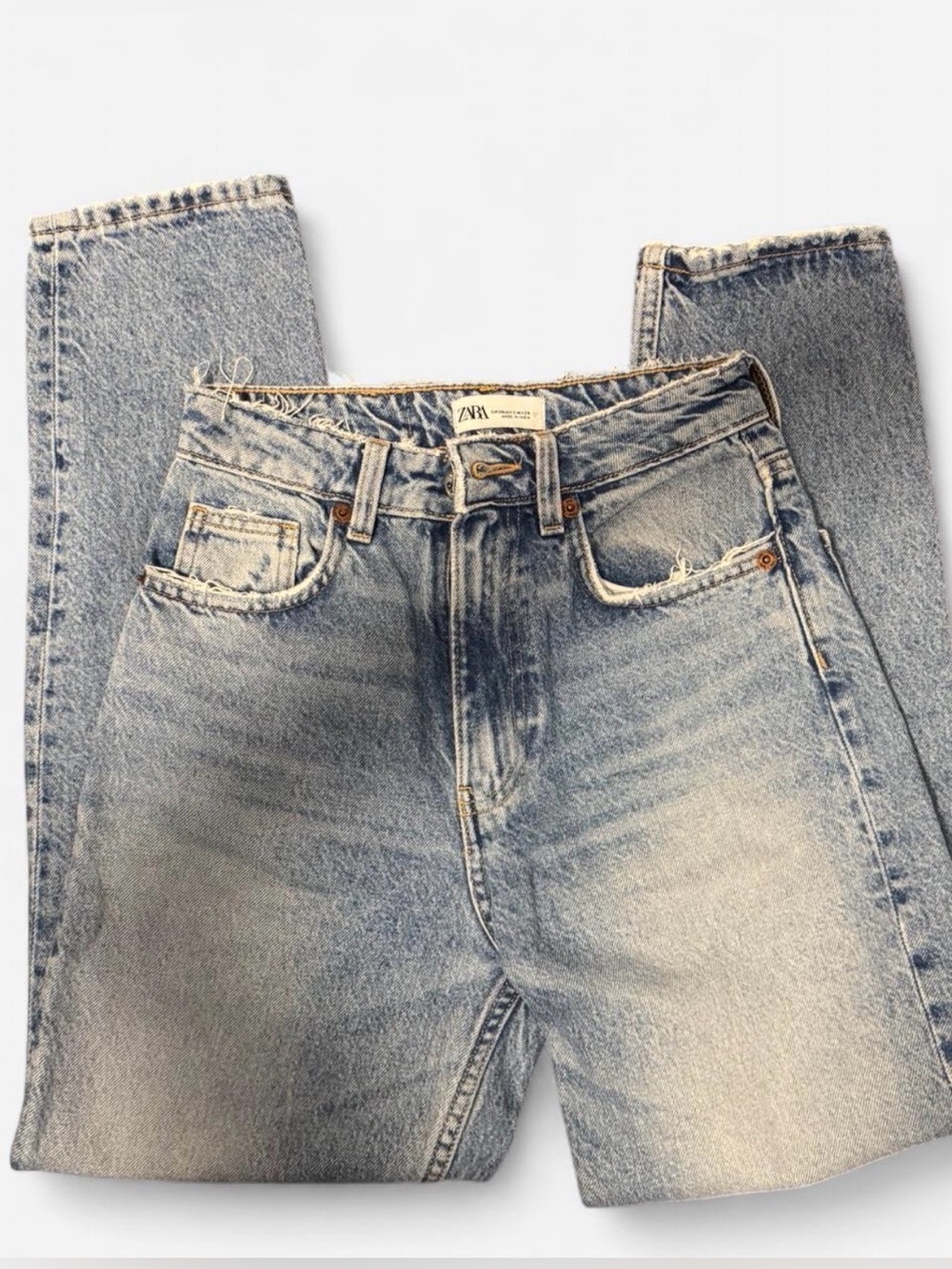 Light blue distressed Zara mom jeans
